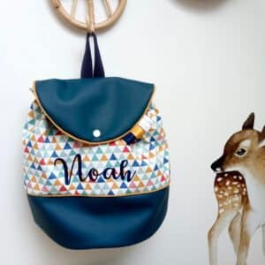 sac à dos, simili paon et gros triangles colorés